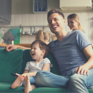 Dad and children watching movies