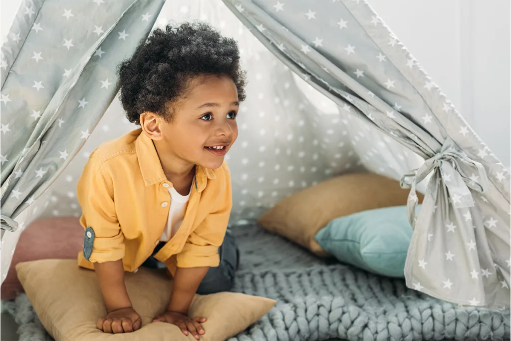 Toddler transitioning from a crib to a bed
