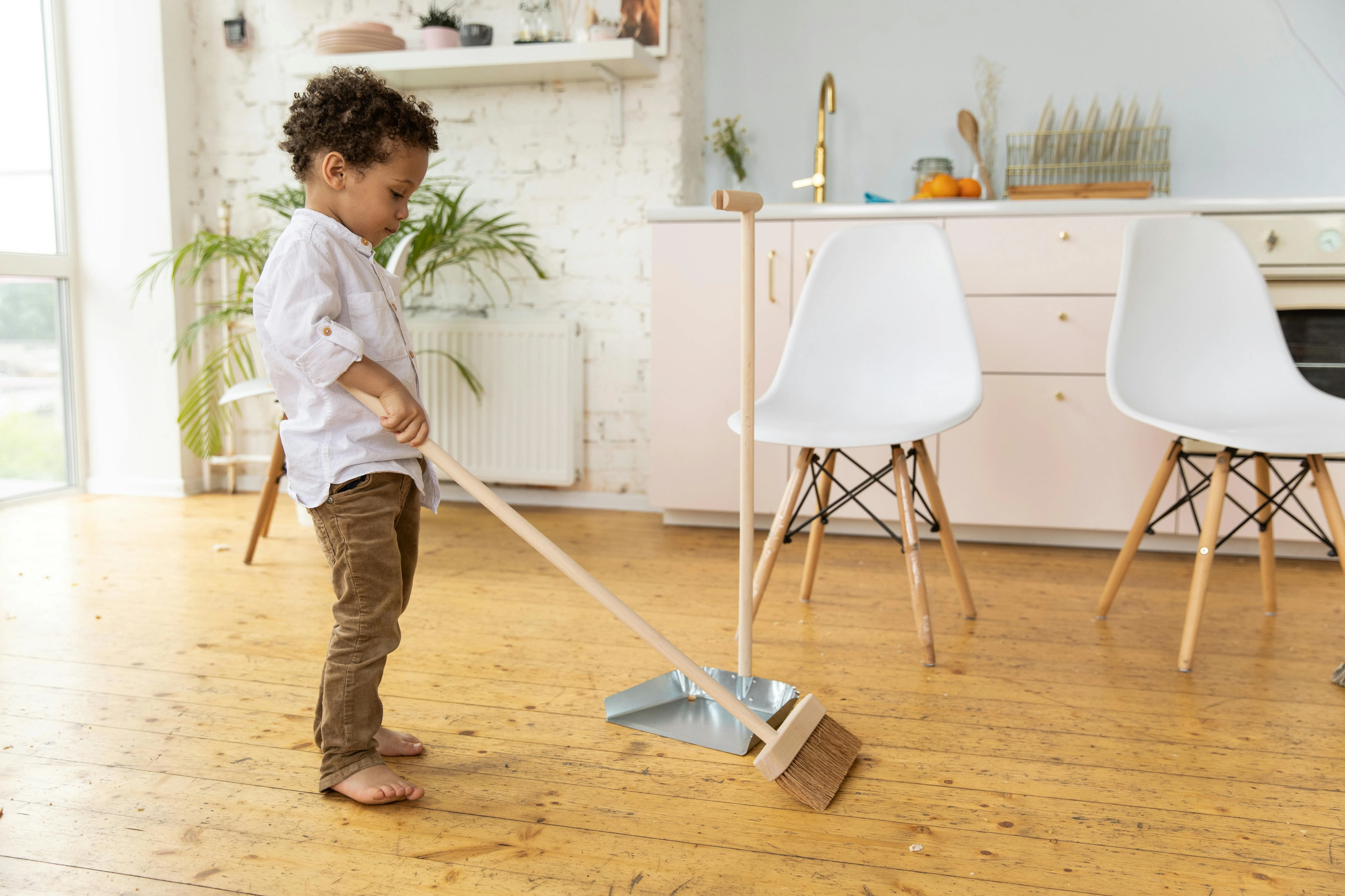 Child sweeping