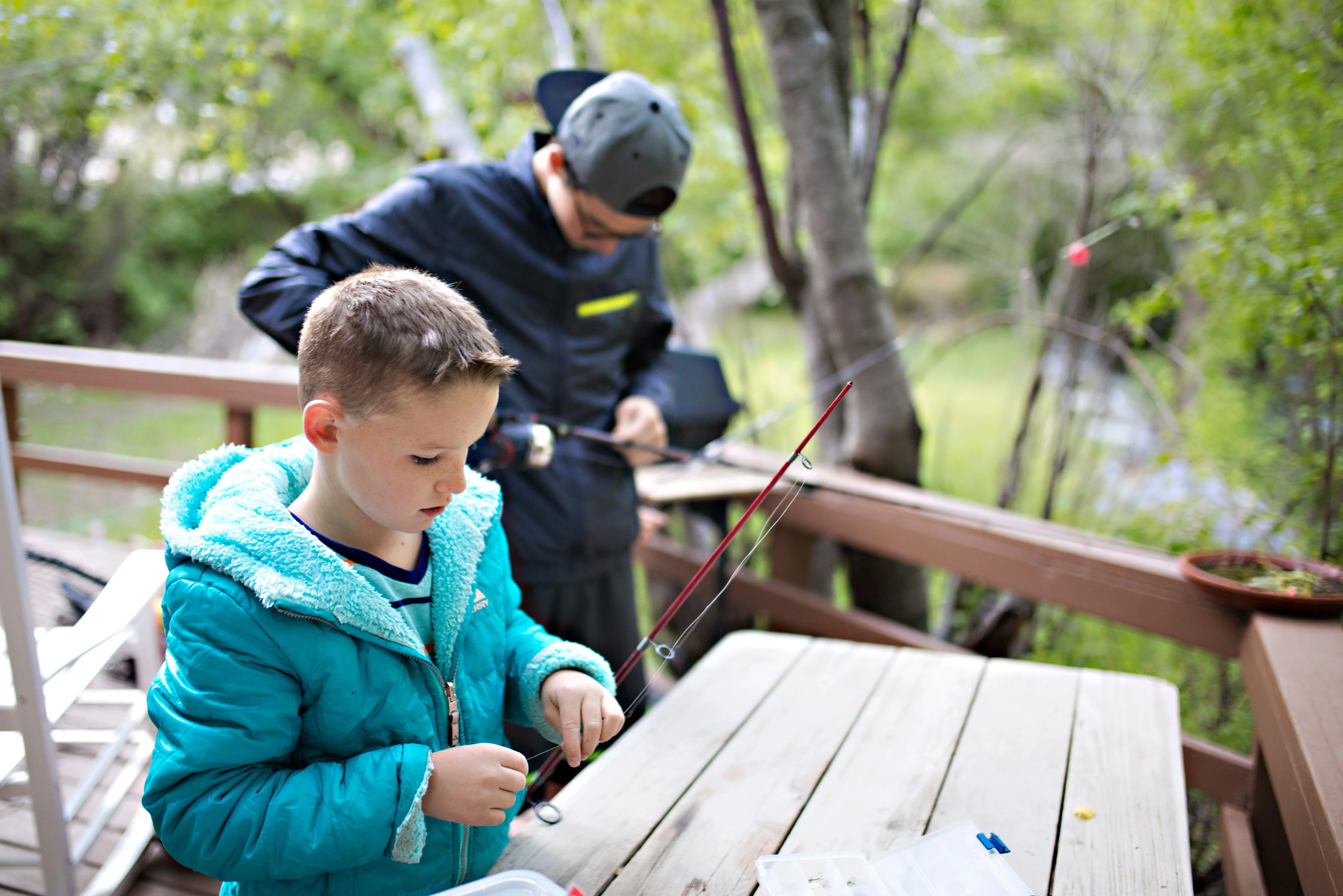 Au Pair and kid fishing