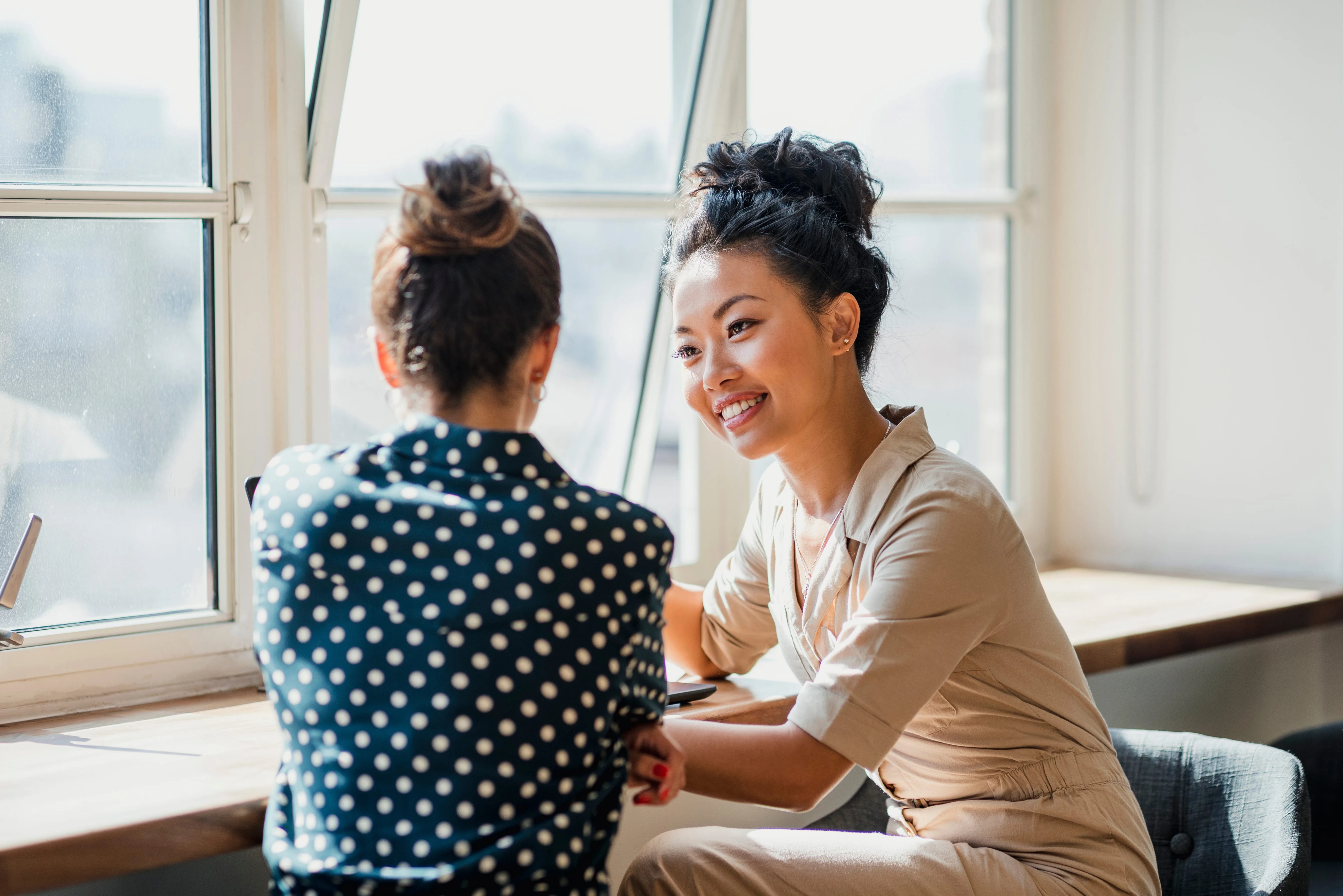 Host Mom and Au Pair in a family meeting