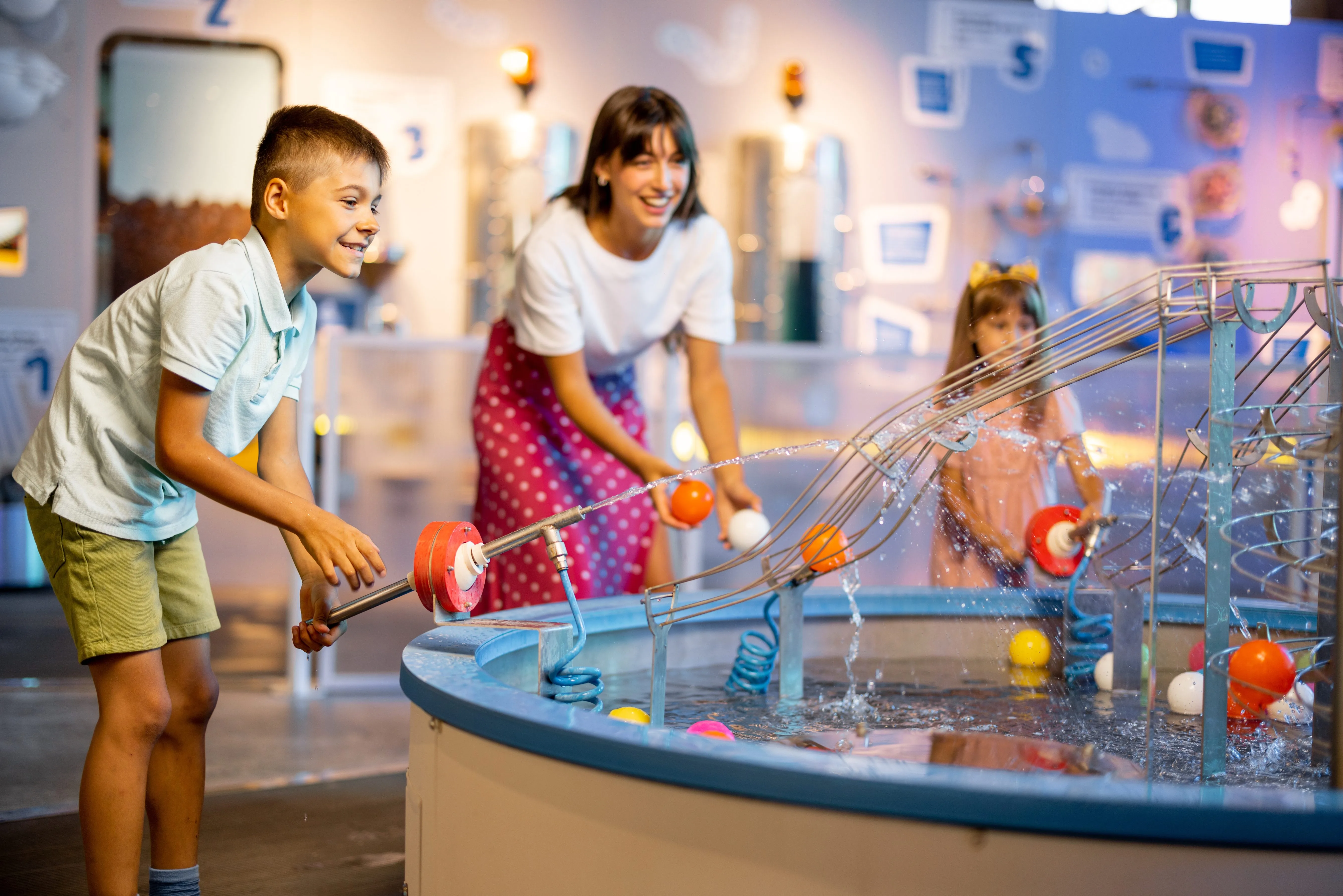 Au Pair and kids at a museum