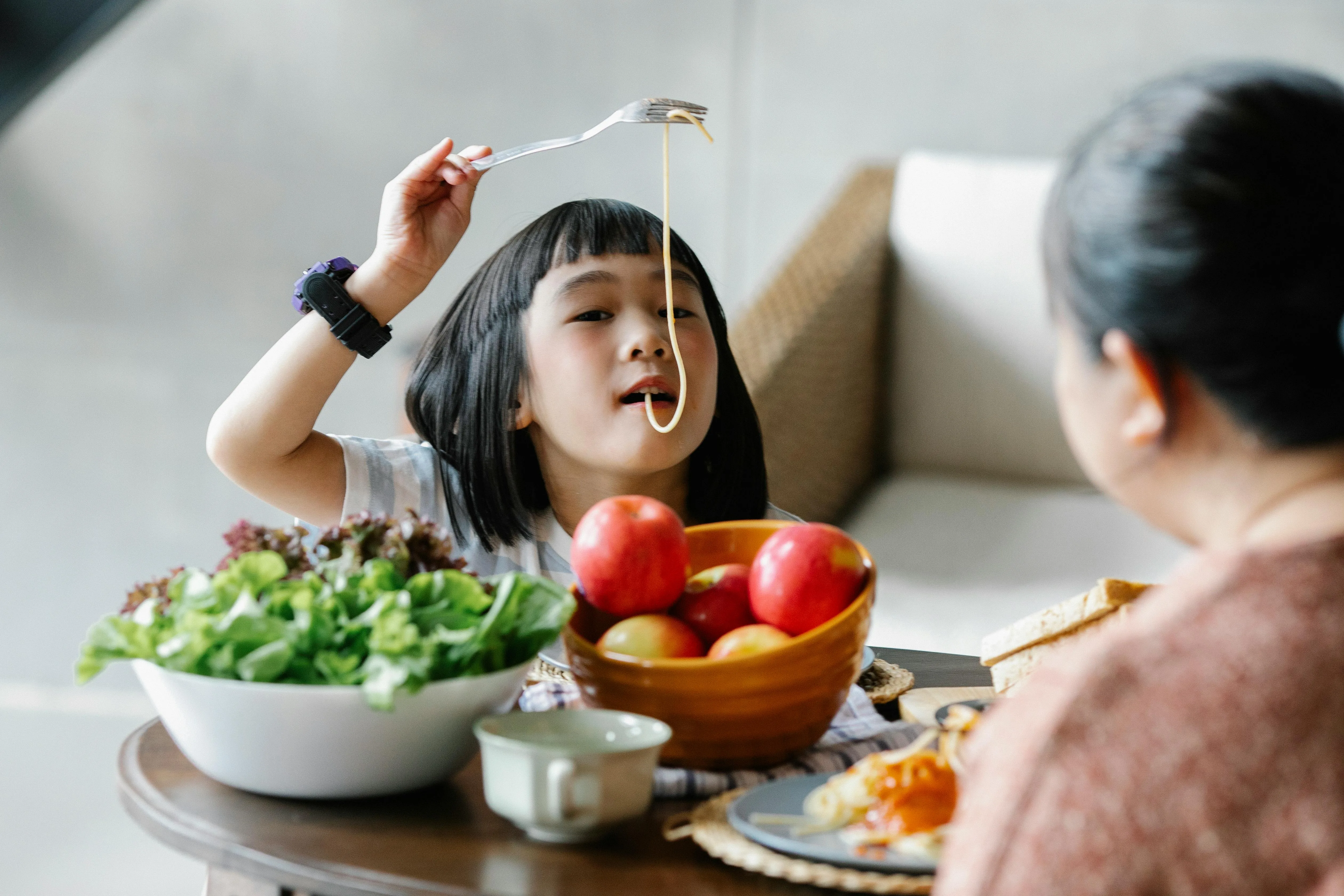 Young girl eating a balanced healthy meal