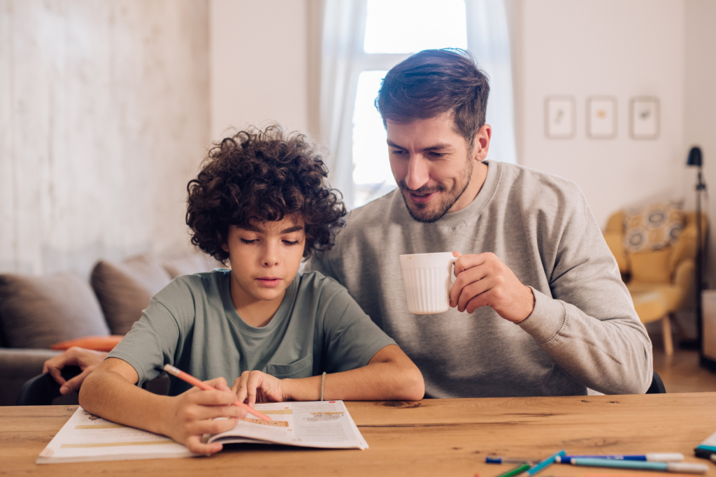 Au Pair helping kid with homework