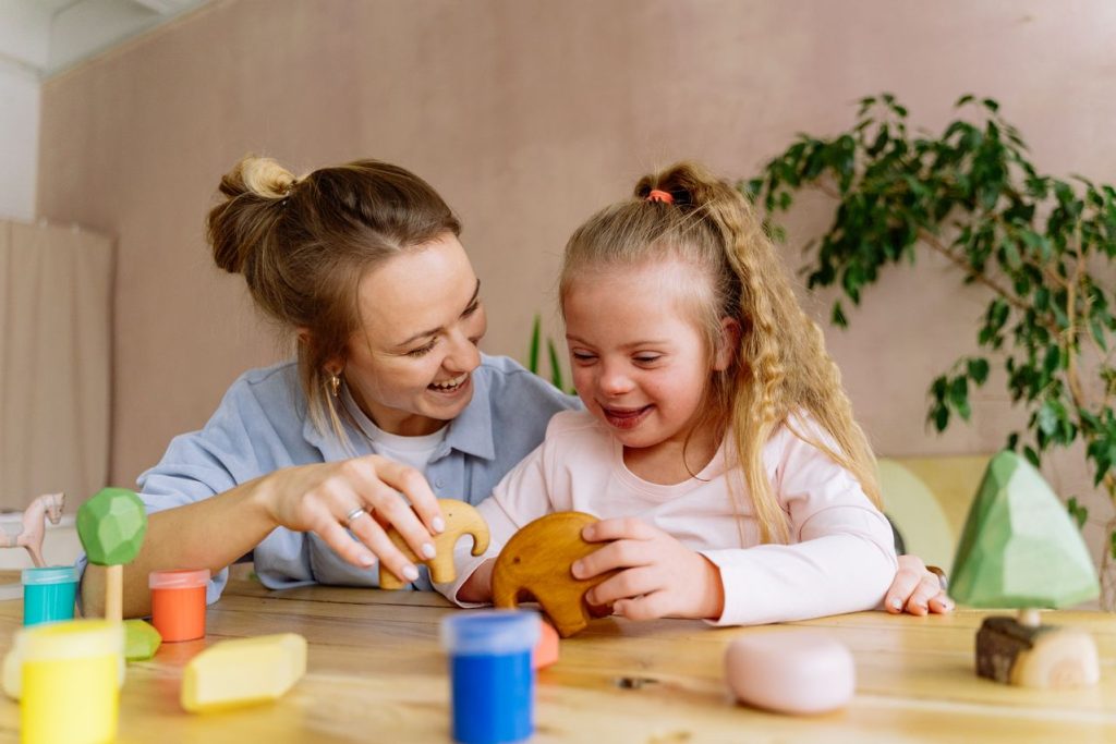 Au Pair playing with a child